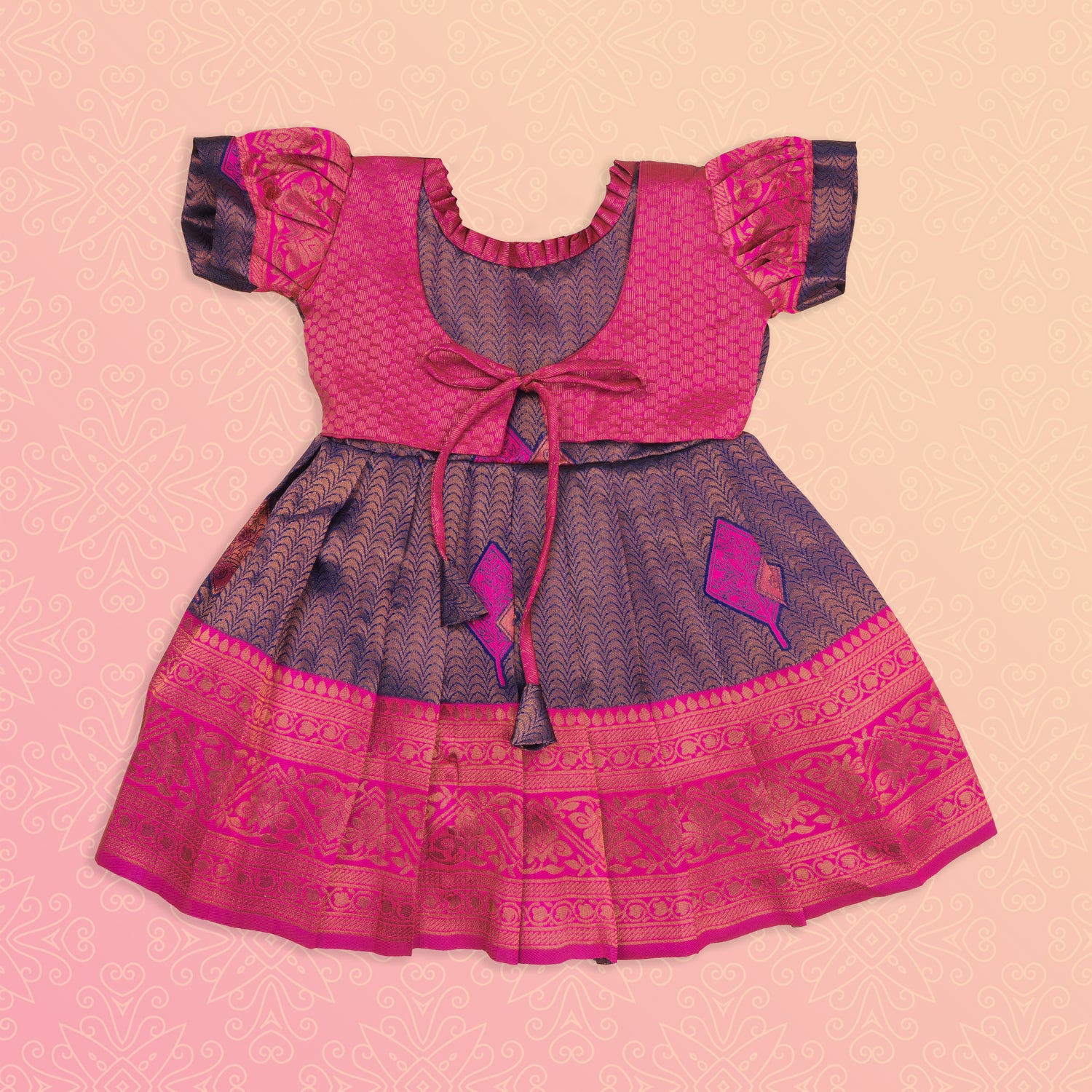 Navy blue and pink ethnic frock for girls by Boon Babies, featuring traditional Pattu fabric and intricate embroidery.