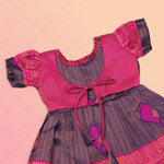 Navy blue and pink ethnic frock for girls by Boon Babies, featuring traditional Pattu fabric and intricate embroidery design.