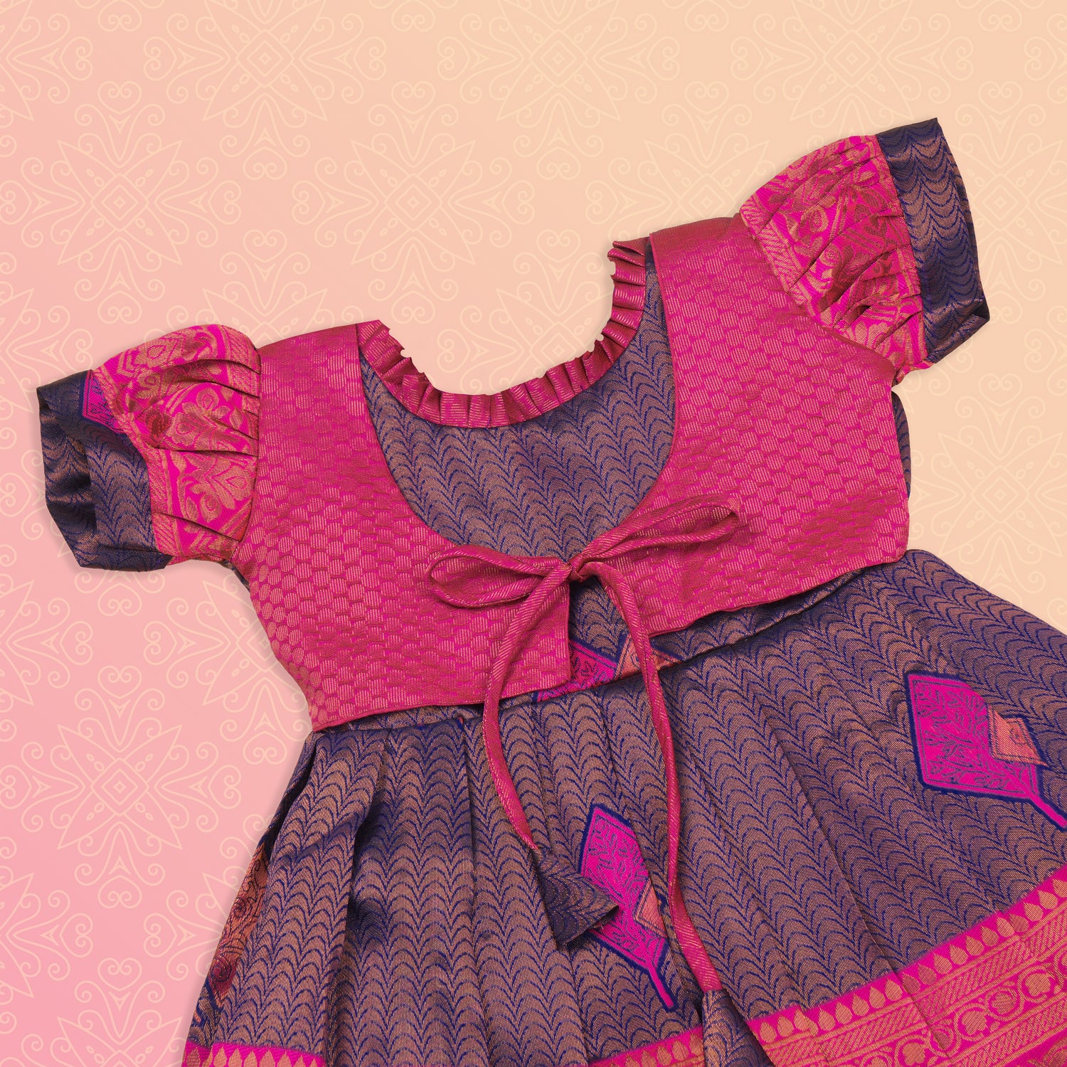 Navy blue and pink ethnic frock for girls by Boon Babies, featuring traditional Pattu fabric and intricate embroidery design.