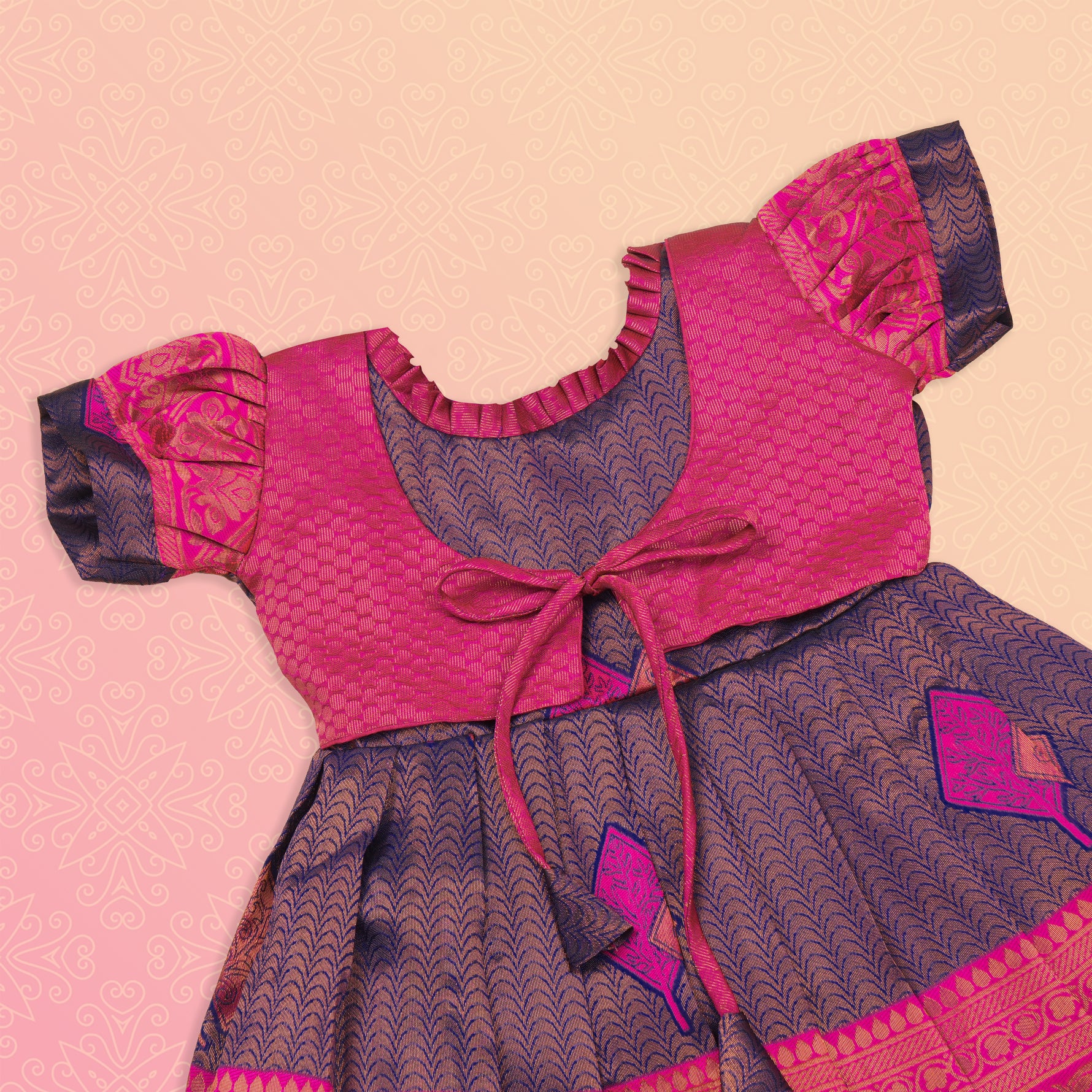 Navy blue and pink ethnic frock for girls by Boon Babies, featuring traditional Pattu fabric and intricate embroidery design.