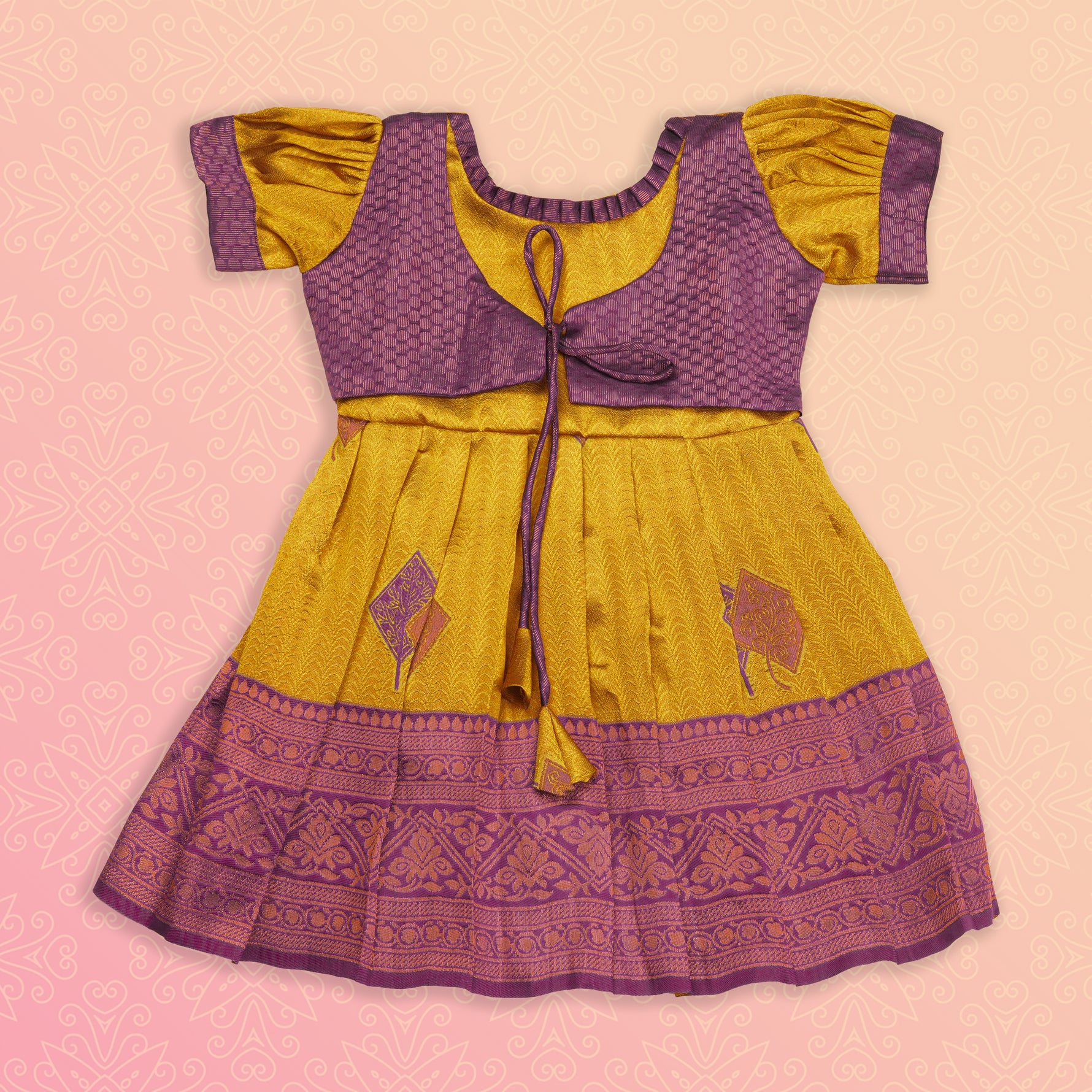 Elegant mustard purple ethnic frock for girls by Boon Babies, featuring traditional Pattu fabric and detailed craftsmanship.