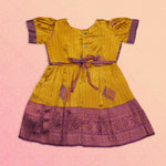 Ethnic girls' frock in mustard purple with intricate embroidery, by Boon Babies, featuring traditional design and vibrant fabric.