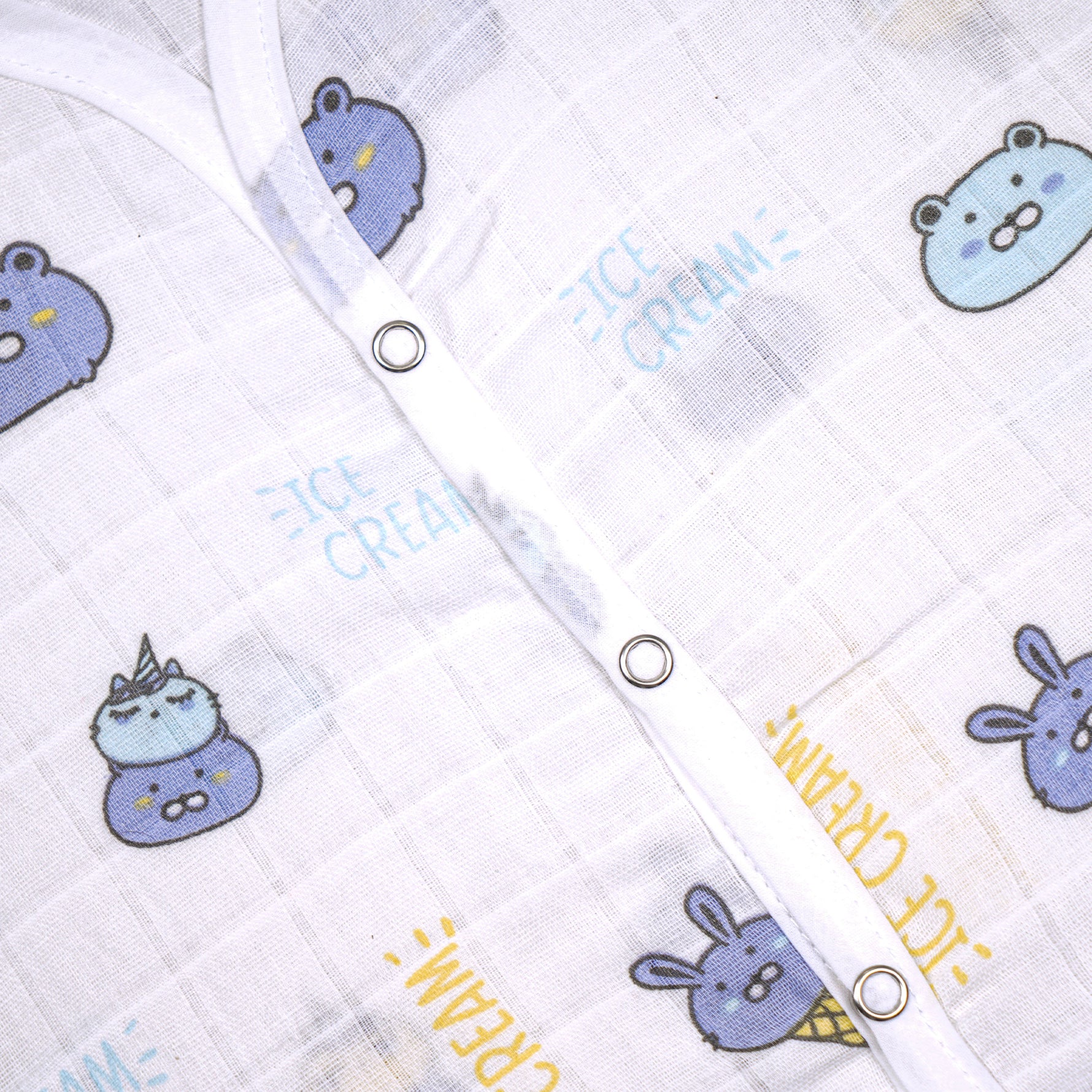 Soft, breathable printed sleeveless muslin jabla for babies 0-12 months, made by Boon Babies, ideal for newborn wear.