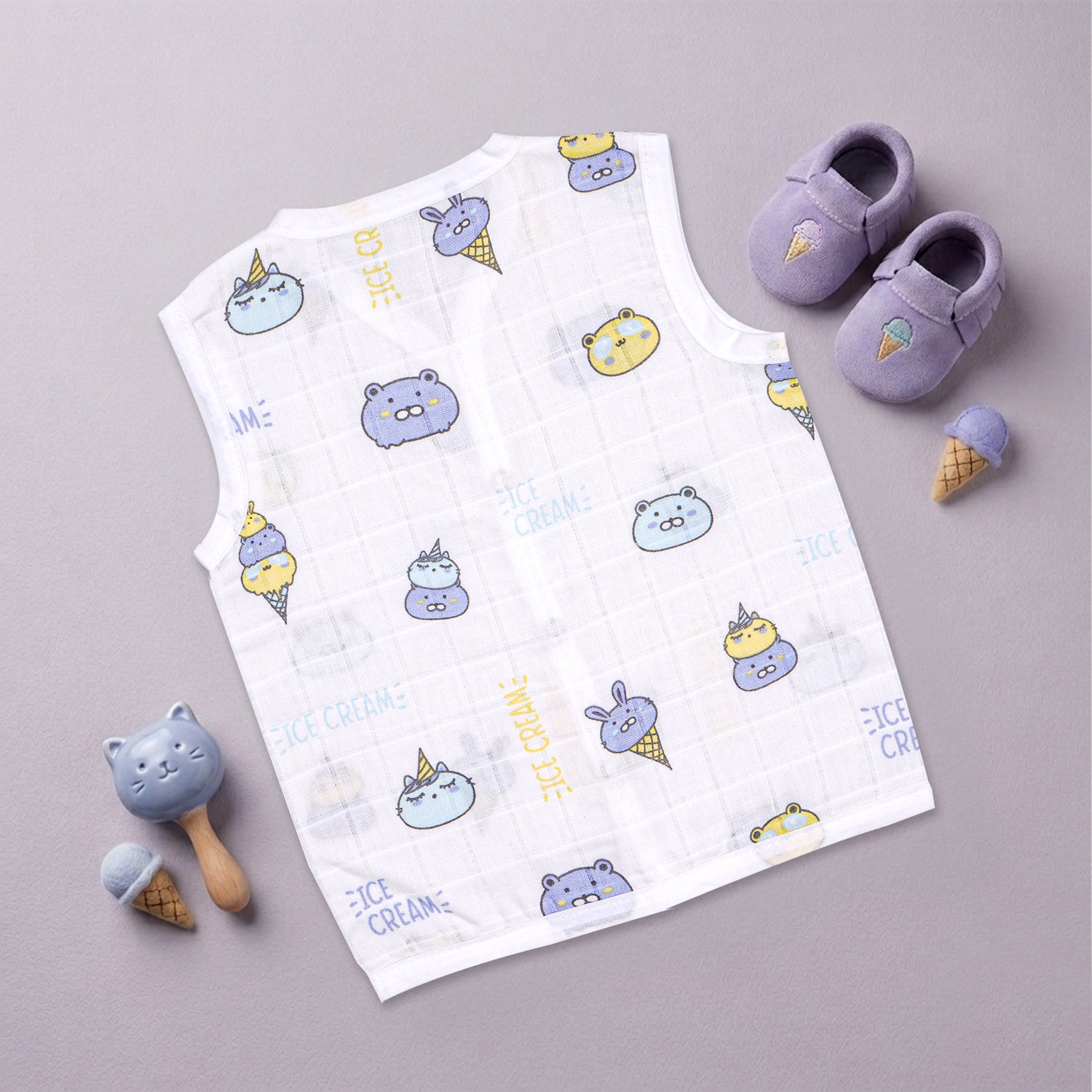 Soft, breathable printed muslin jabla for babies aged 0-12 months by Boon Babies, featuring a comfortable sleeveless design.