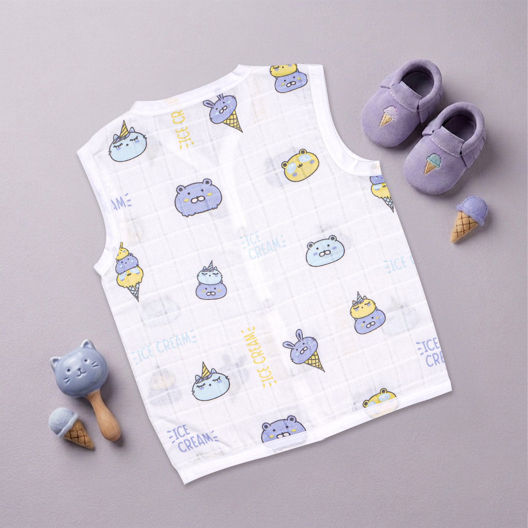 Soft, breathable printed muslin jabla for babies aged 0-12 months by Boon Babies, featuring a comfortable sleeveless design.