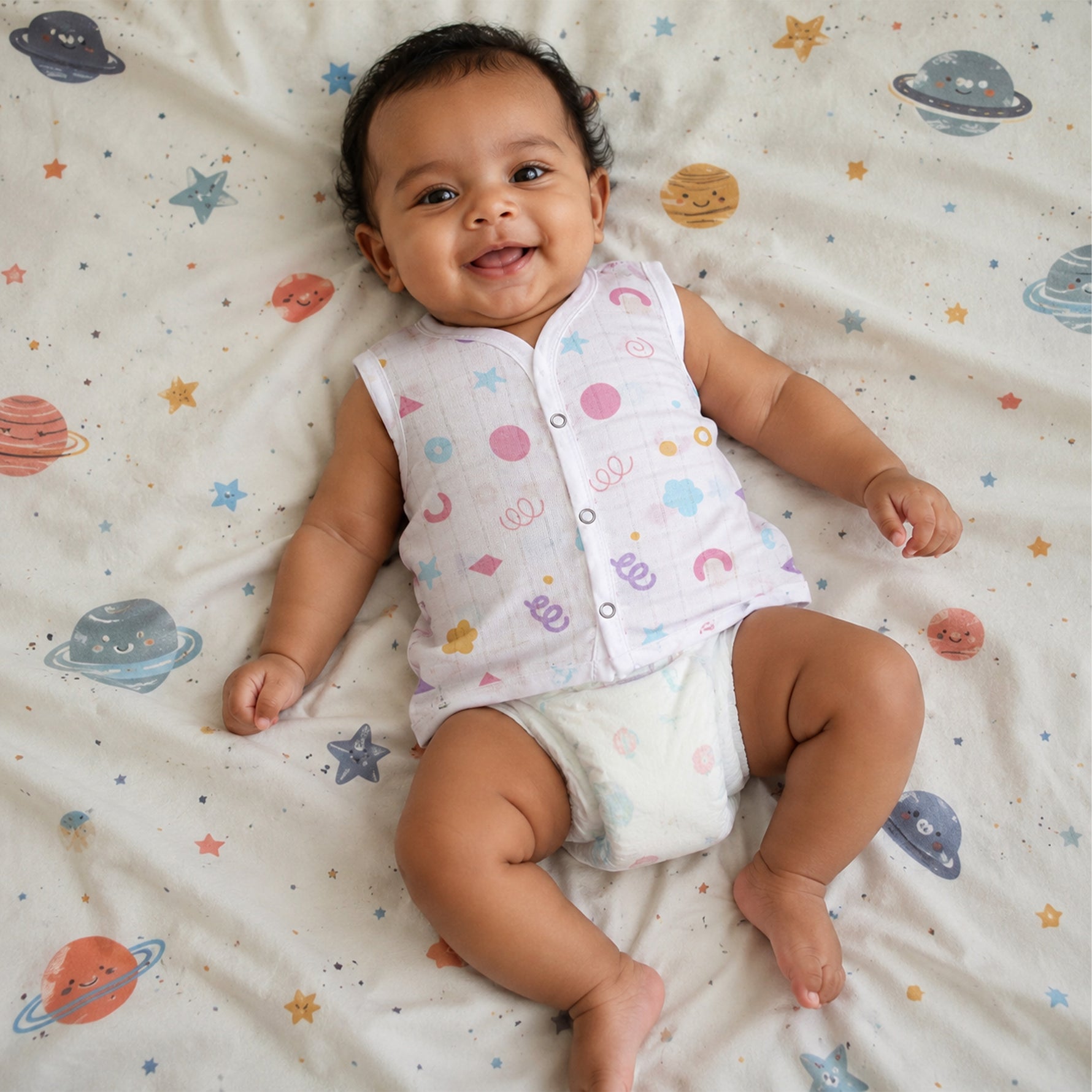 Soft, breathable printed sleeveless muslin jabla for babies 0-12 months, made by Boon Babies, perfect for newborn wear.