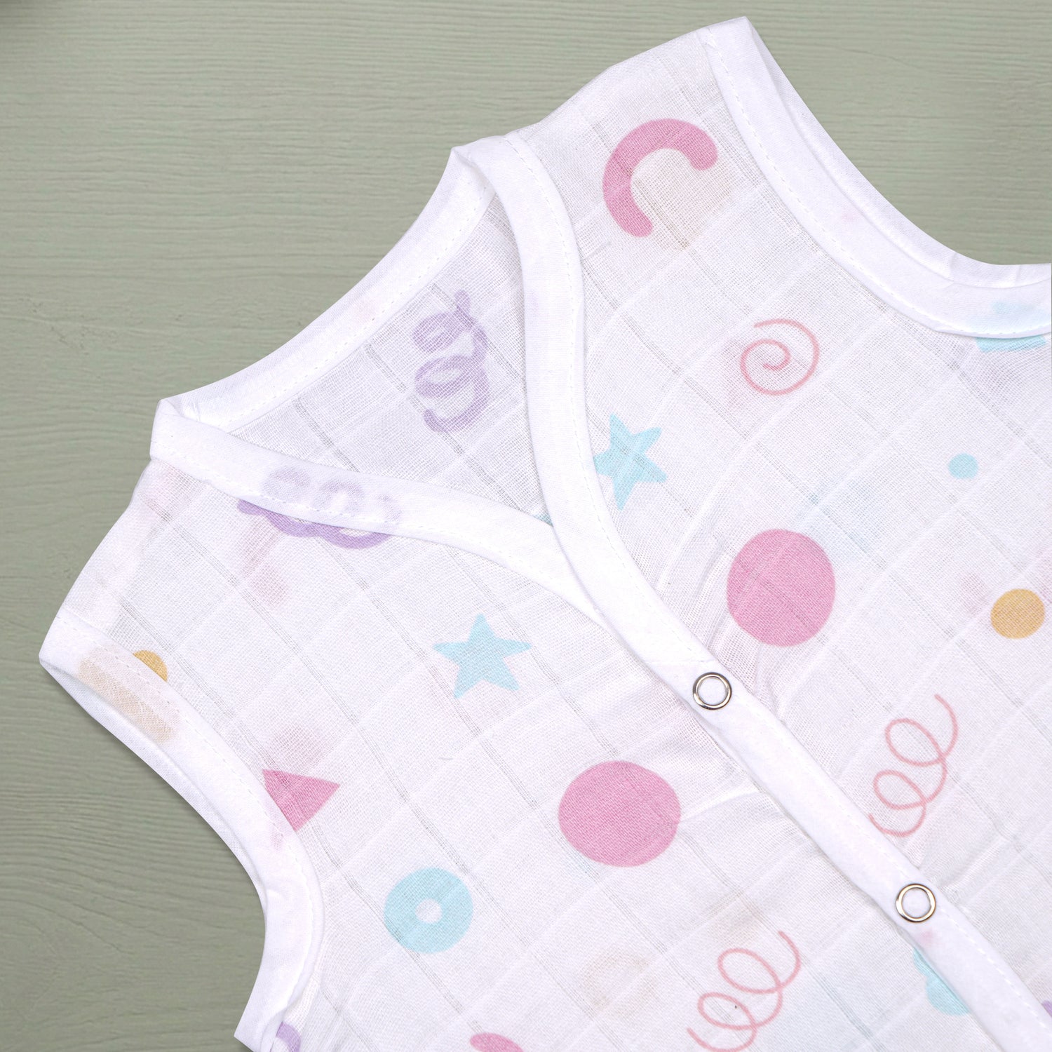 Printed sleeveless muslin jabla for babies from Boon Babies, soft breathable newborn wear for 0–12 months.