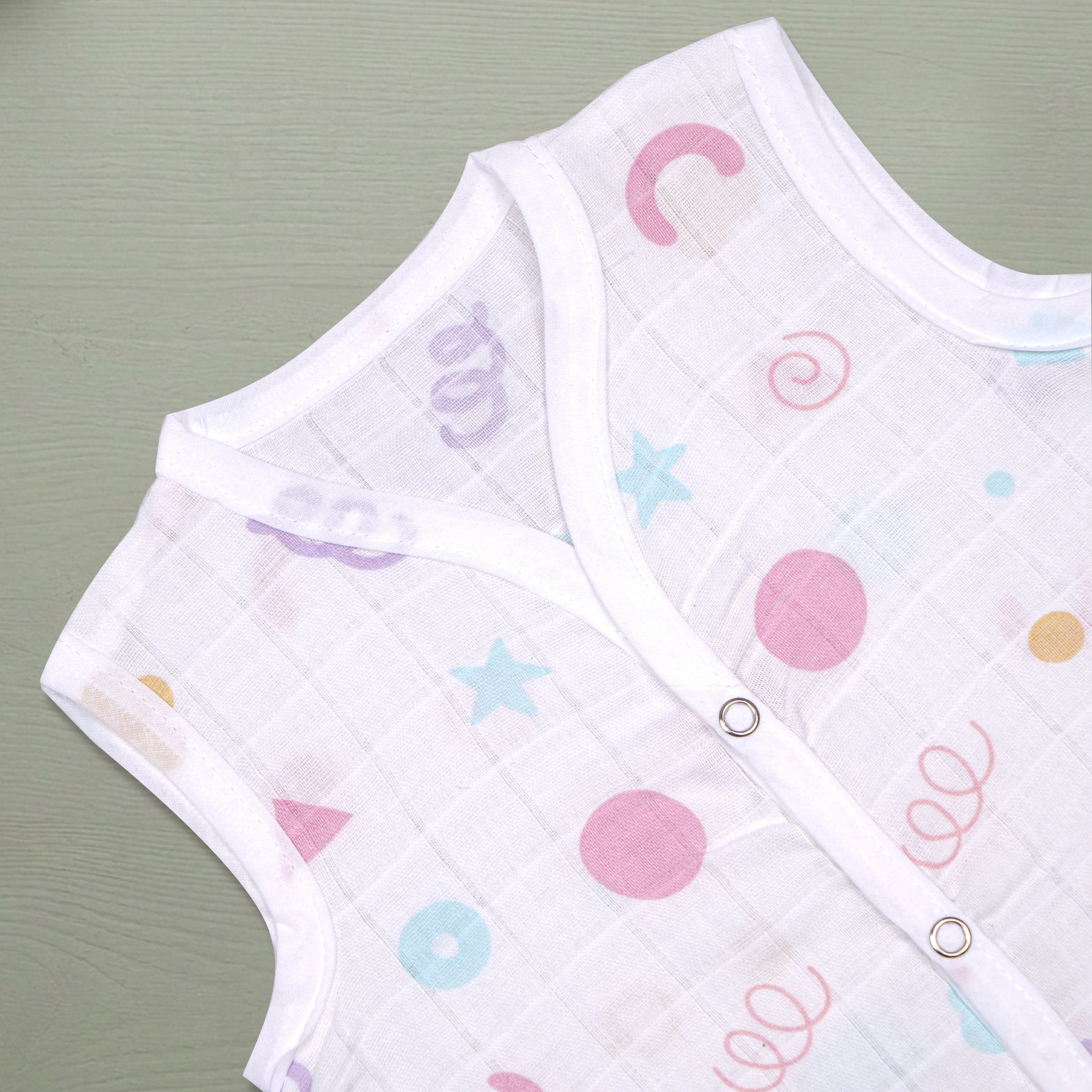 Printed sleeveless muslin jabla for babies from Boon Babies, soft breathable newborn wear for 0–12 months.