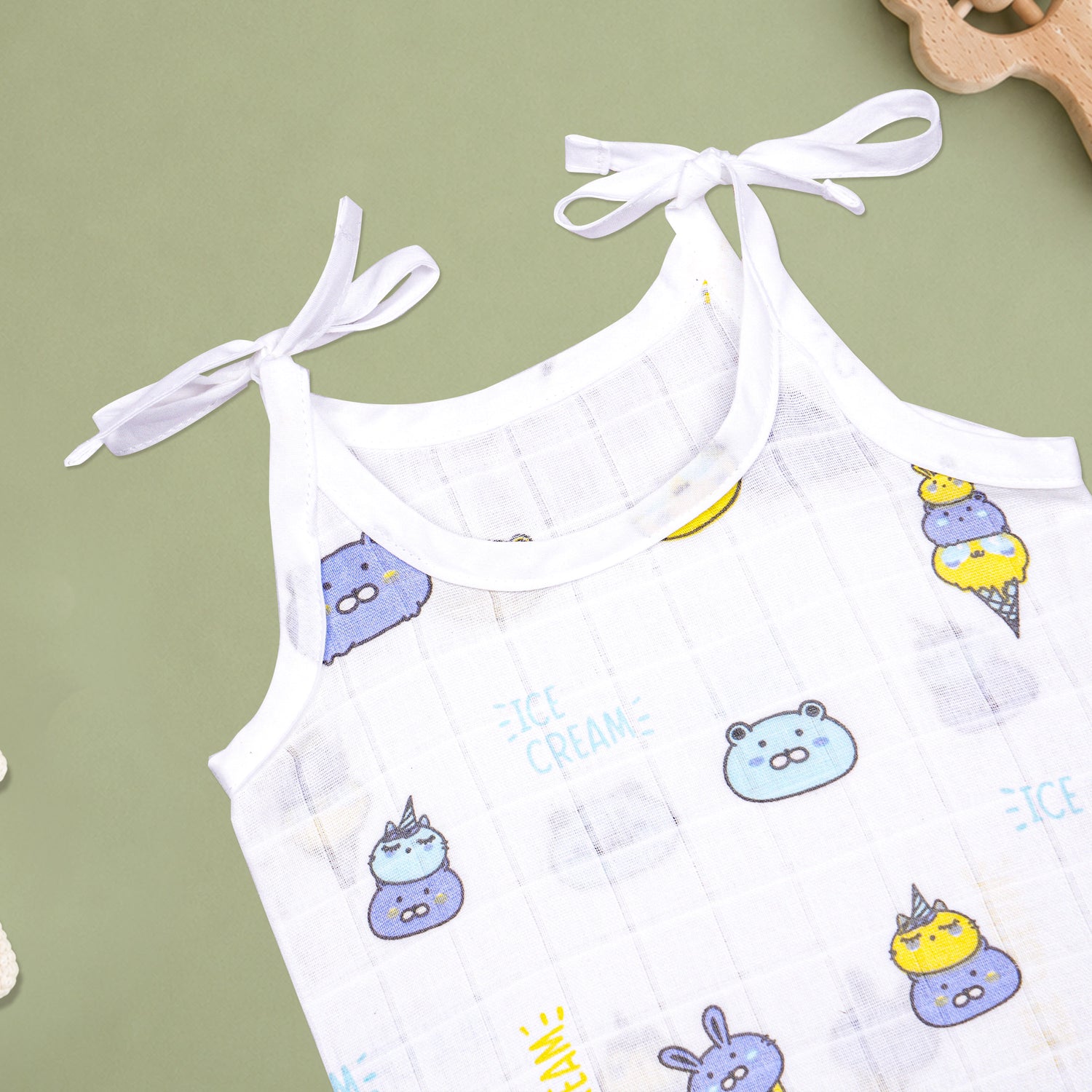 Soft printed Boonbabies muslin knot jabla for babies, featuring a tie-up design, suitable for infants aged 0–6 months.
