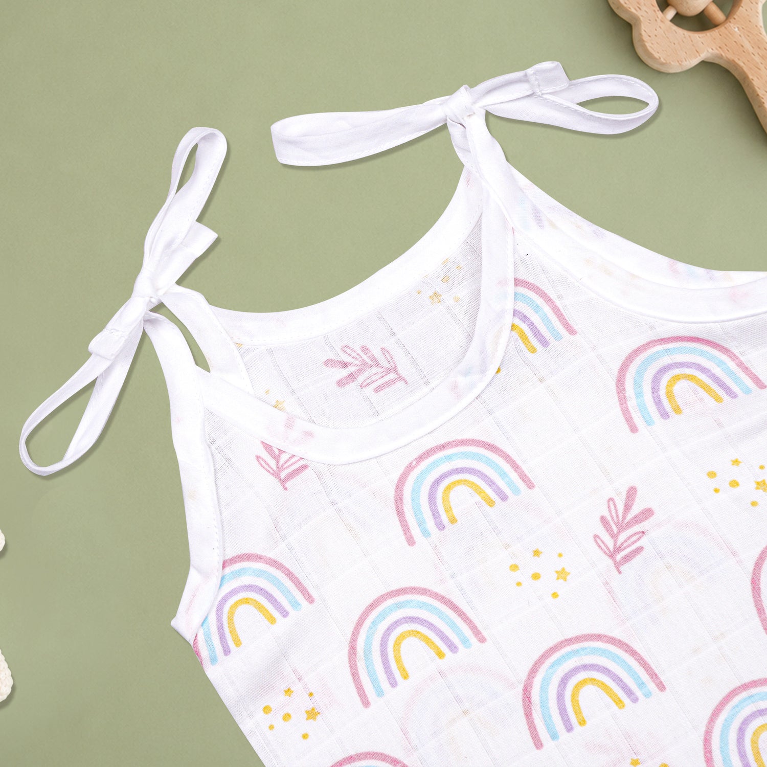 Soft printed boonbabies muslin knot jabla for babies, 0-6 months, featuring a tie-up design and comfortable fabric.