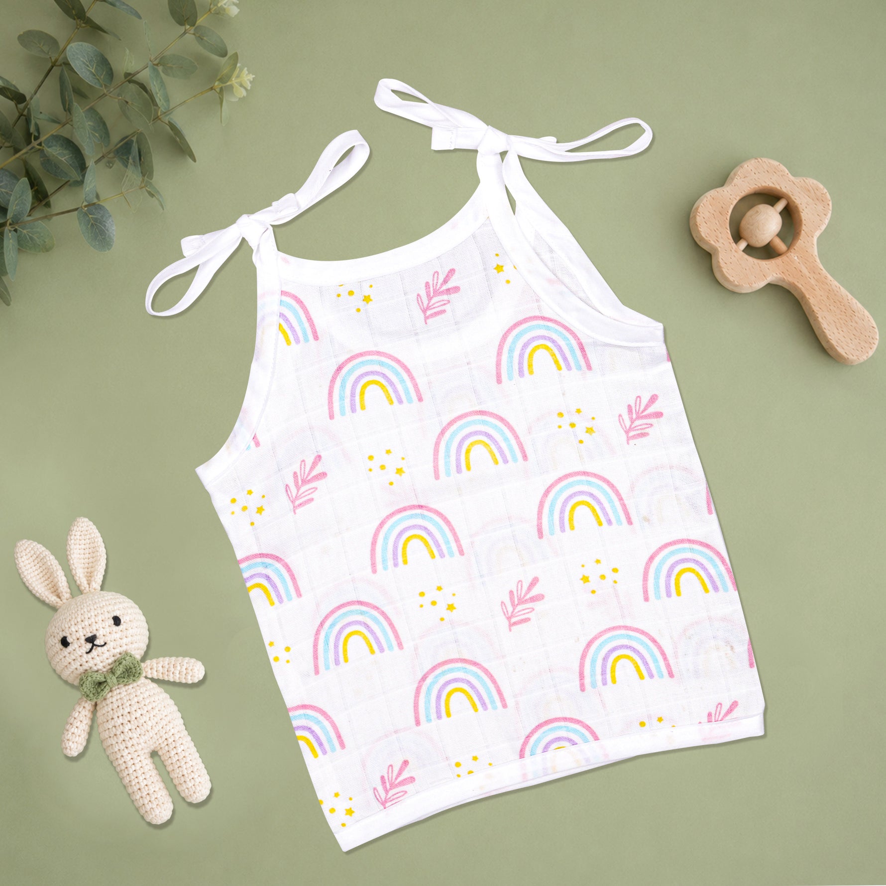 Soft printed boonbabies muslin knot jabla for babies, 0-6 months, featuring a tie-up baby top with gentle, breathable fabric.