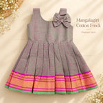 Baby girl grey Mangalagiri cotton frock front view with pleated skirt, shoulder bow and pink woven border