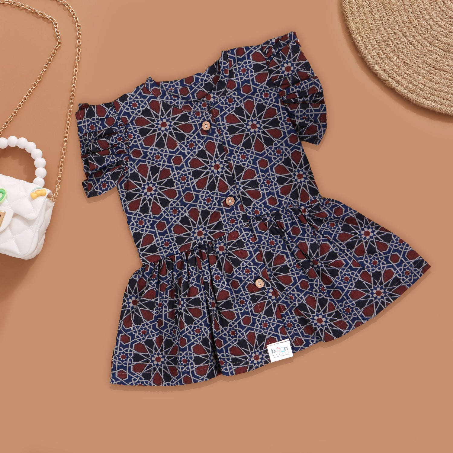 Geometric Flair: Girls' Printed Frock with Unique Patterns