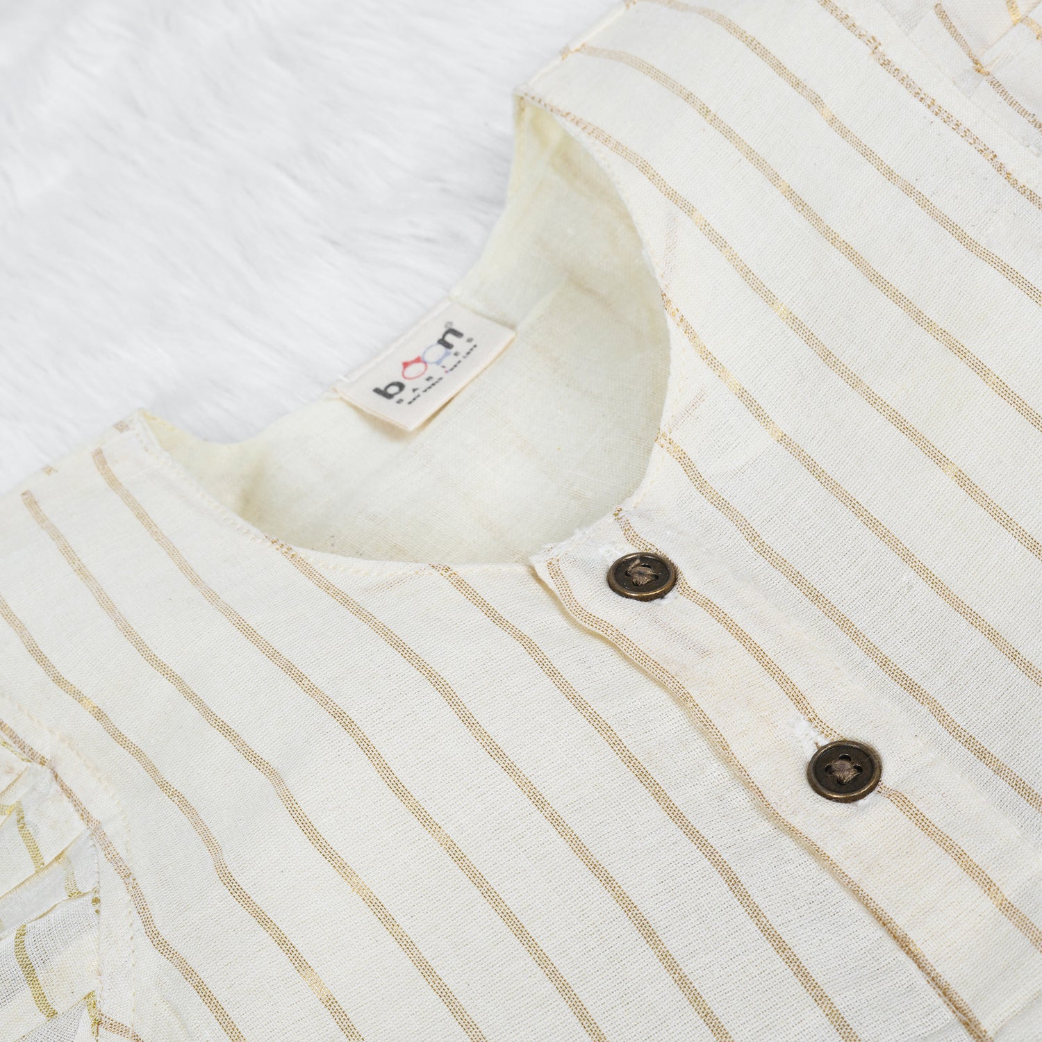 White Cotton Baby Frill Frock with Black Floral Prints & Zari Border