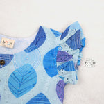 Baby girls hakoba frill frock in blue leaf print (NB–24M). Soft cotton with frill sleeves & button closure – stylish festive & casual outfit.