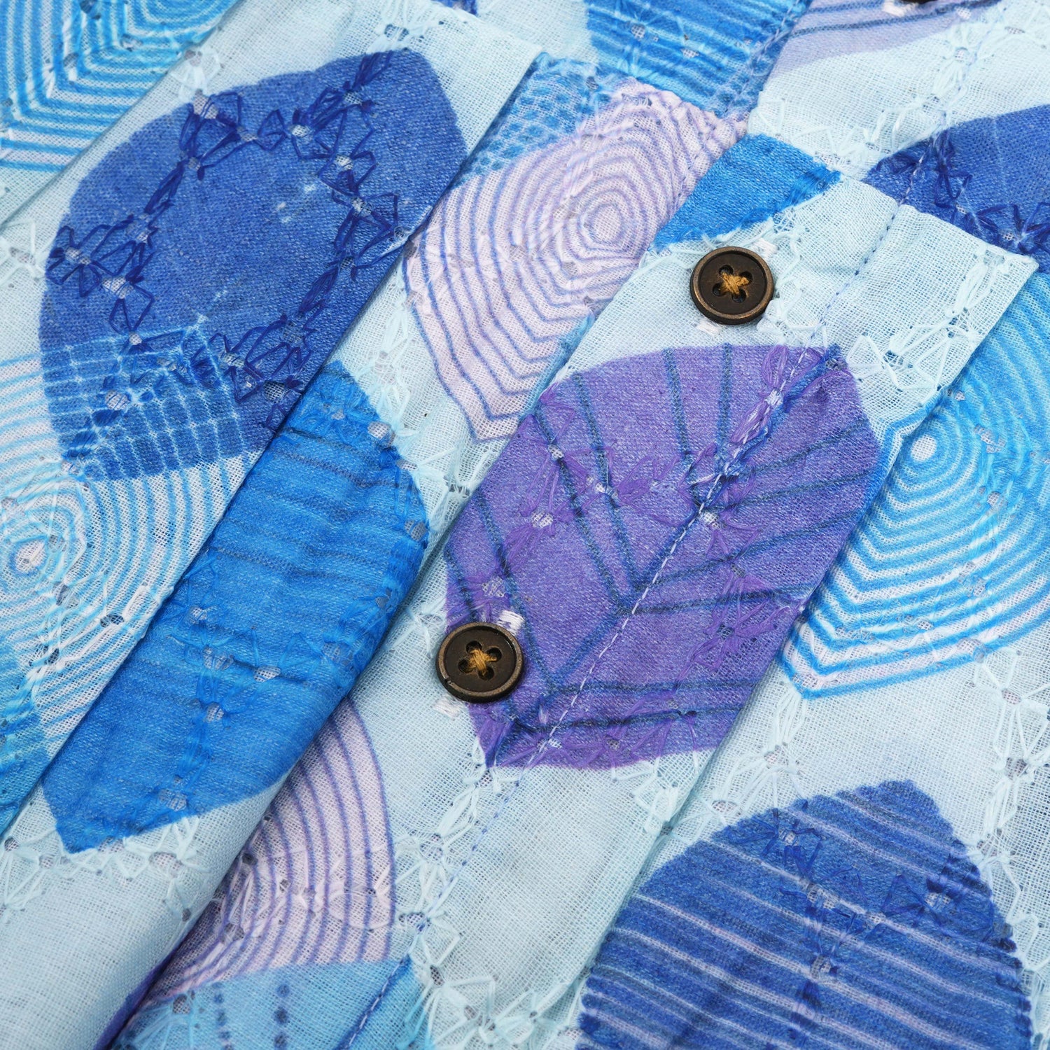 Baby girls hakoba frill frock in blue leaf print (NB–24M). Soft cotton with frill sleeves & button closure – stylish festive & casual outfit.