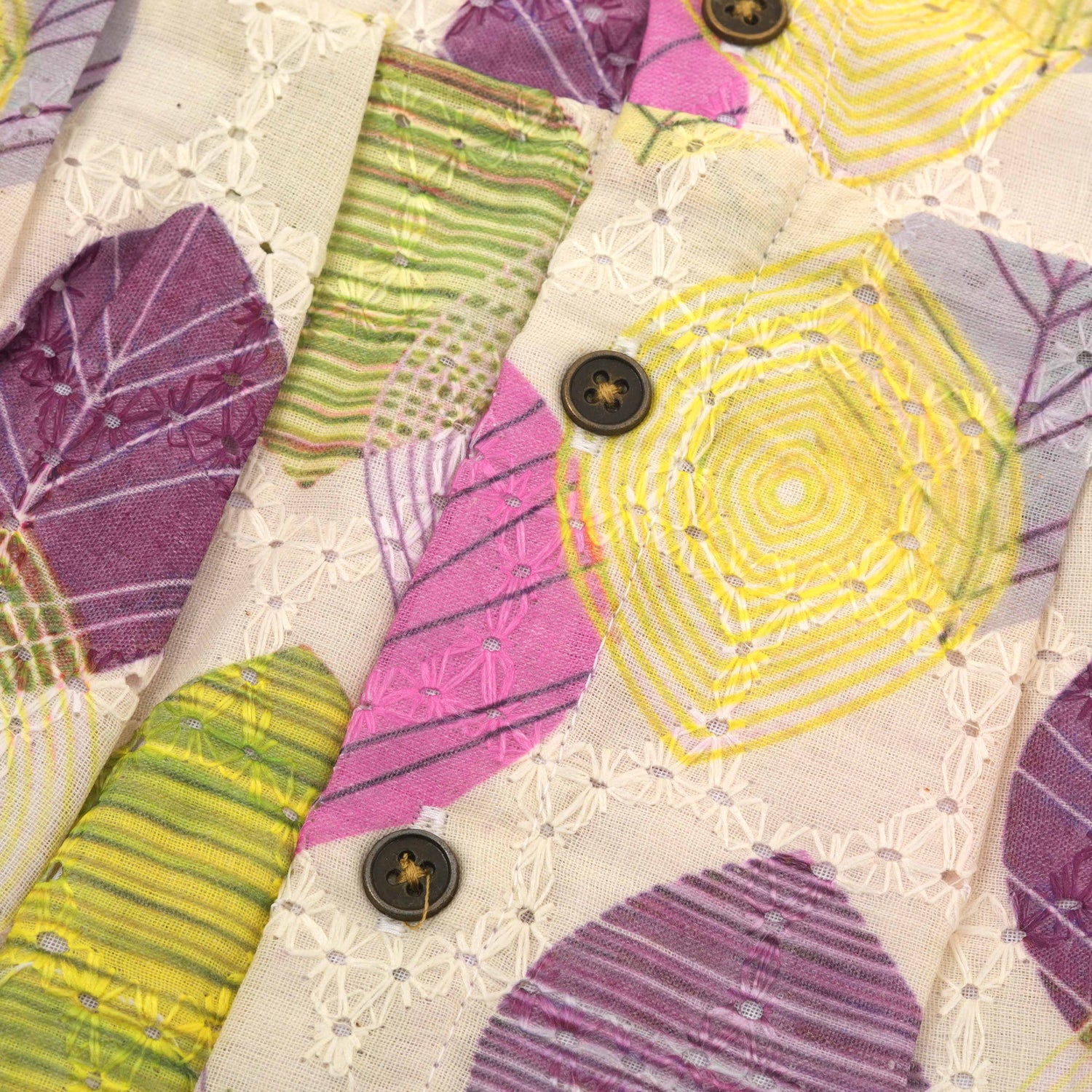 Baby girls hakoba frill frock with leaf print in yellow, purple & pink (NB–24M). Soft cotton, frill sleeves & button-down style – comfy & stylish.