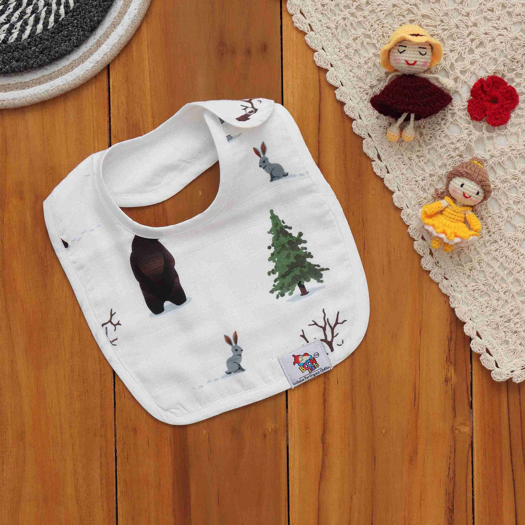Soft muslin bib with bear and bunny forest prints. Snap-on, breathable, and perfect for feeding and drool-time. Free size fit.