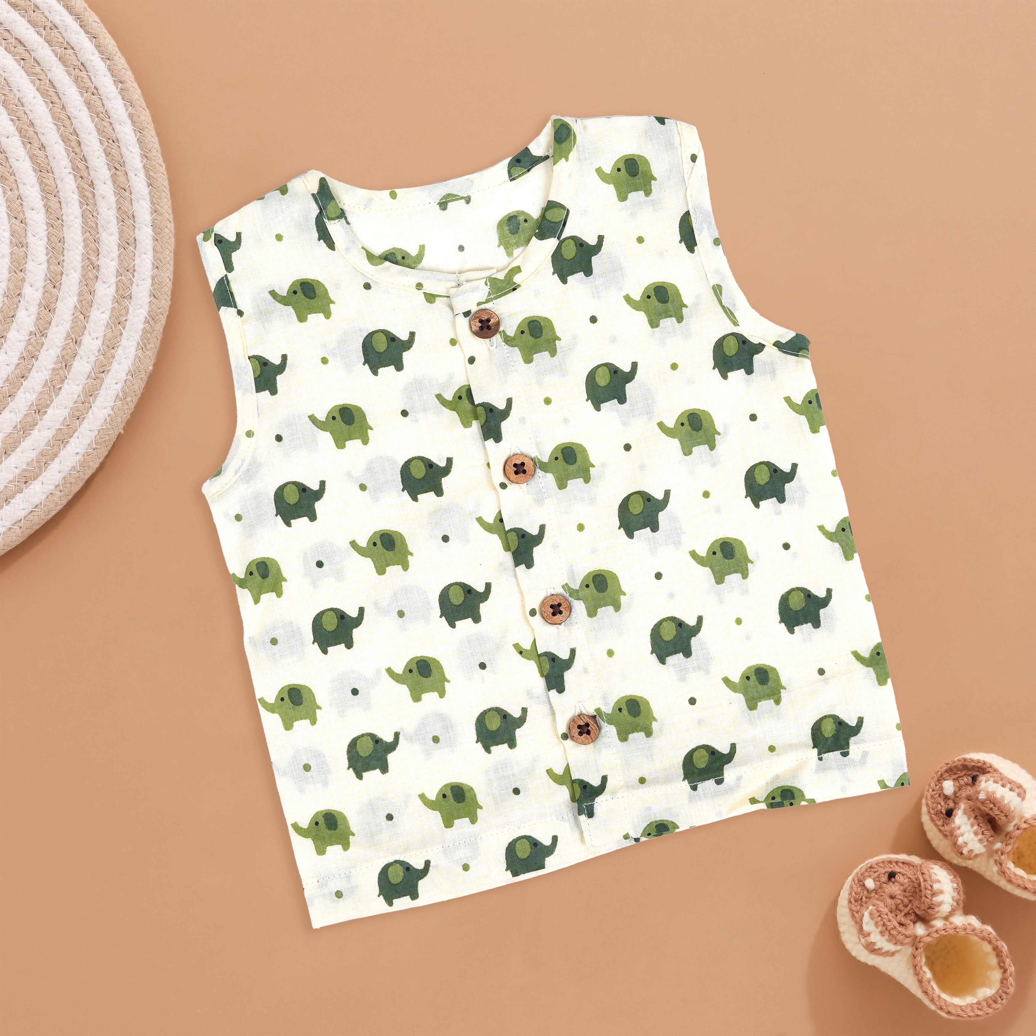 Cotton baby jabla with sleeveless design and green elephant print, by Boon Babies, suitable for 0-3 months old.