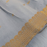 Grey silk knot frock with zari border & pleated design for baby girls (0–12 months). Stylish, festive & comfortable.
