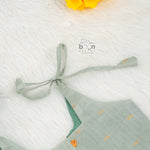 Festive silk knot frock for baby girls (6–12 months) with zari border & tie-up straps. Perfect for Onam & traditional celebrations.
