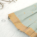 Festive silk knot frock for baby girls (6–12 months) with zari border & tie-up straps. Perfect for Onam & traditional celebrations.
