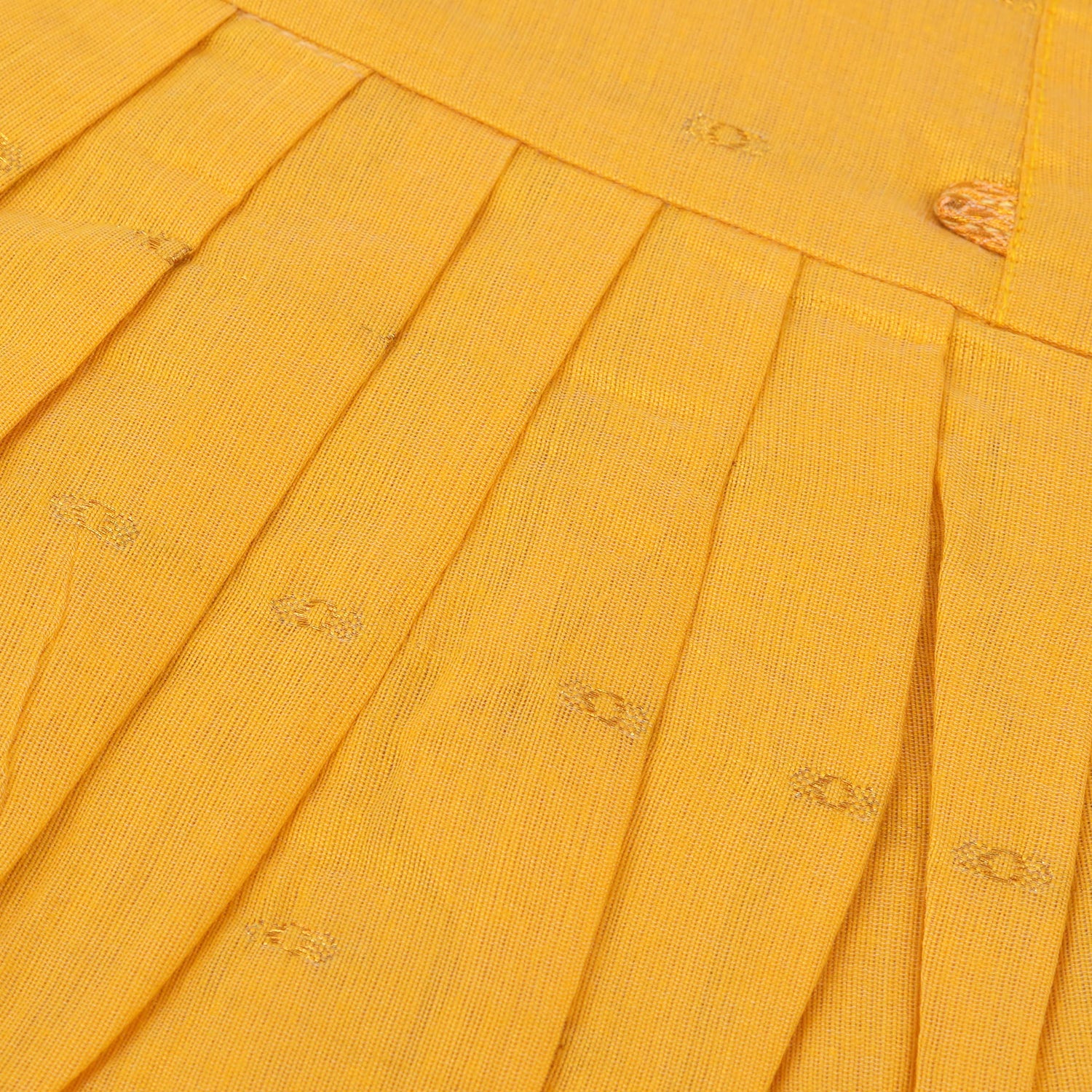 Mustard yellow silk knot frock with zari border for baby girls (0–12 months). Traditional, festive & comfortable.