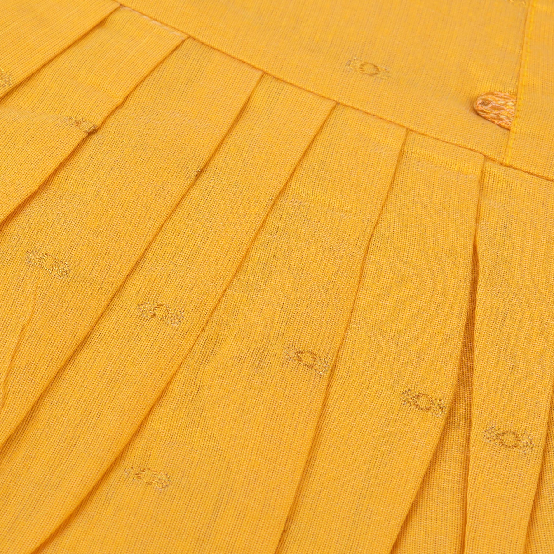 Mustard yellow silk knot frock with zari border for baby girls (0–12 months). Traditional, festive & comfortable.
