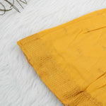 Mustard yellow silk knot frock with zari border for baby girls (0–12 months). Traditional, festive & comfortable.
