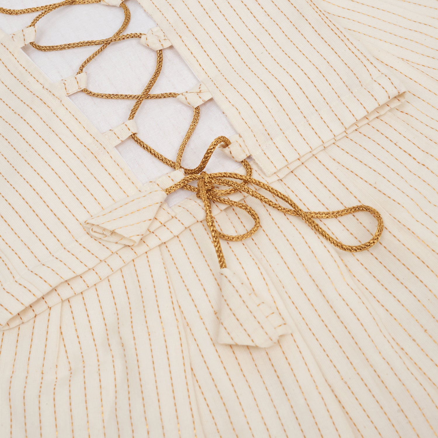 Girls Onam Sleeveless Silk Frock with Golden Stripes – Festive Wear