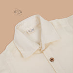 Sandal silk dhoti set with golden zari border for boys (6M–5Y). Elegant & comfortable festive wear for Onam celebrations.