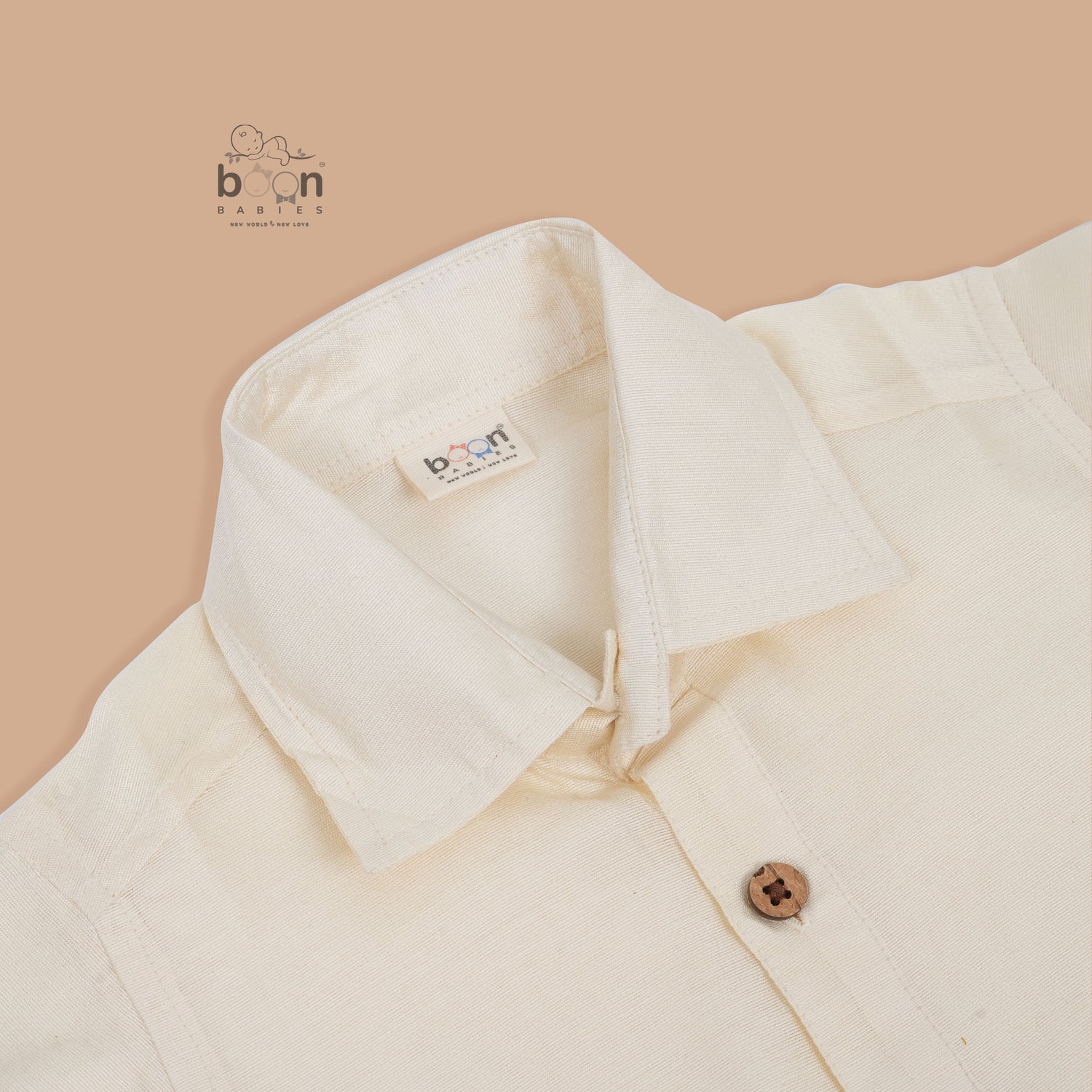 Sandal silk dhoti set with golden zari border for boys (6M–5Y). Elegant & comfortable festive wear for Onam celebrations.