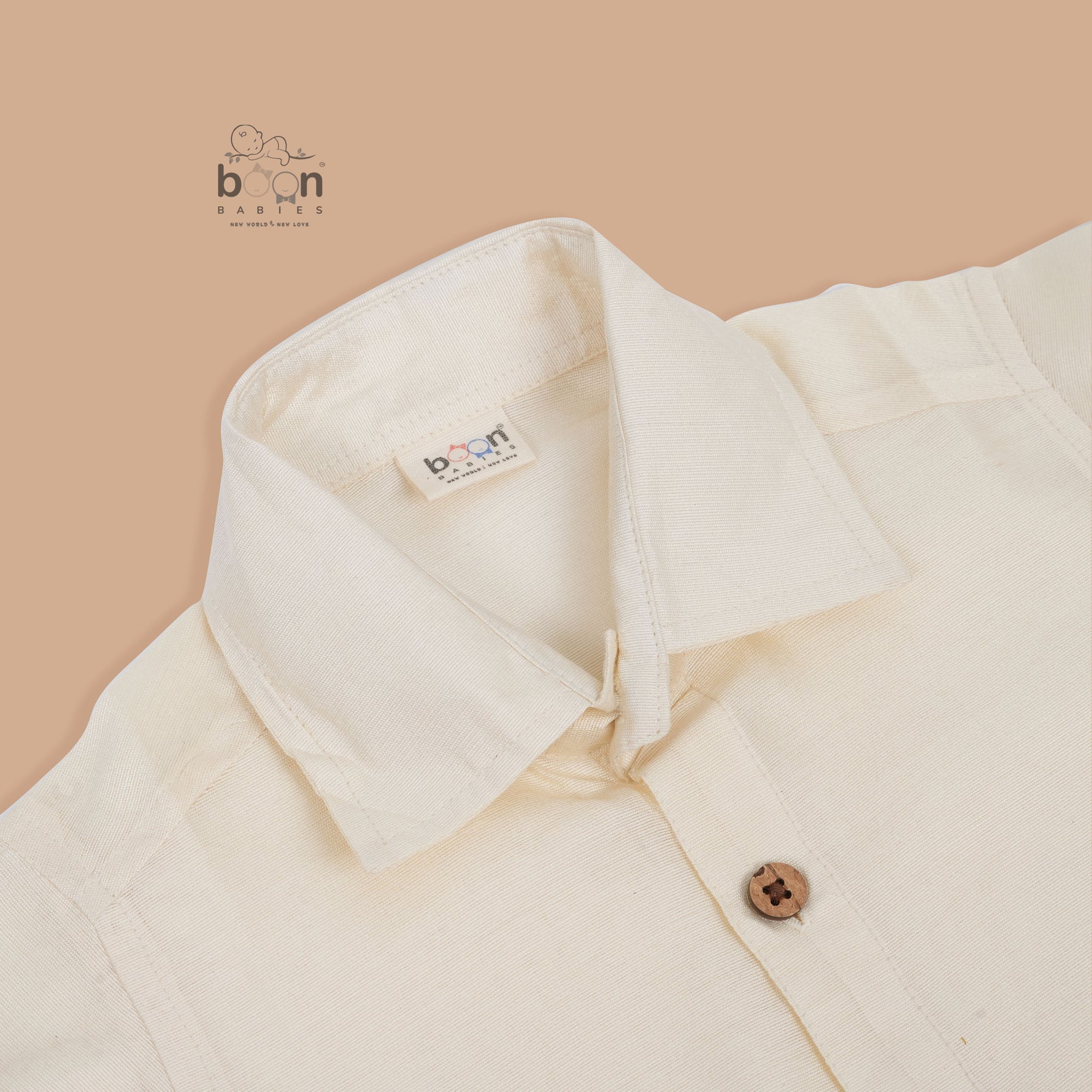 Sandal silk dhoti set with golden zari border for boys (6M–5Y). Elegant & comfortable festive wear for Onam celebrations.