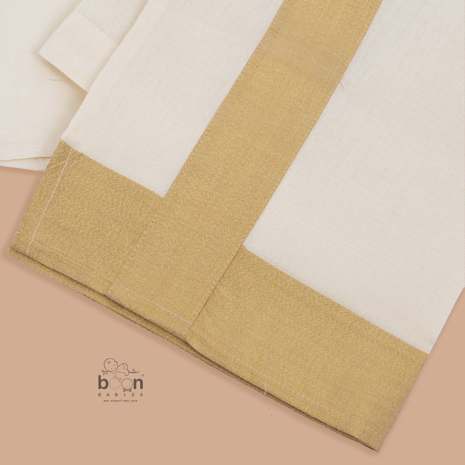 Sandal silk dhoti set with golden zari border for boys (6M–5Y). Elegant & comfortable festive wear for Onam celebrations.