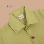 Green silk dhoti set with golden zari border for boys (6M–5Y). Traditional, festive & baby-comfort friendly.