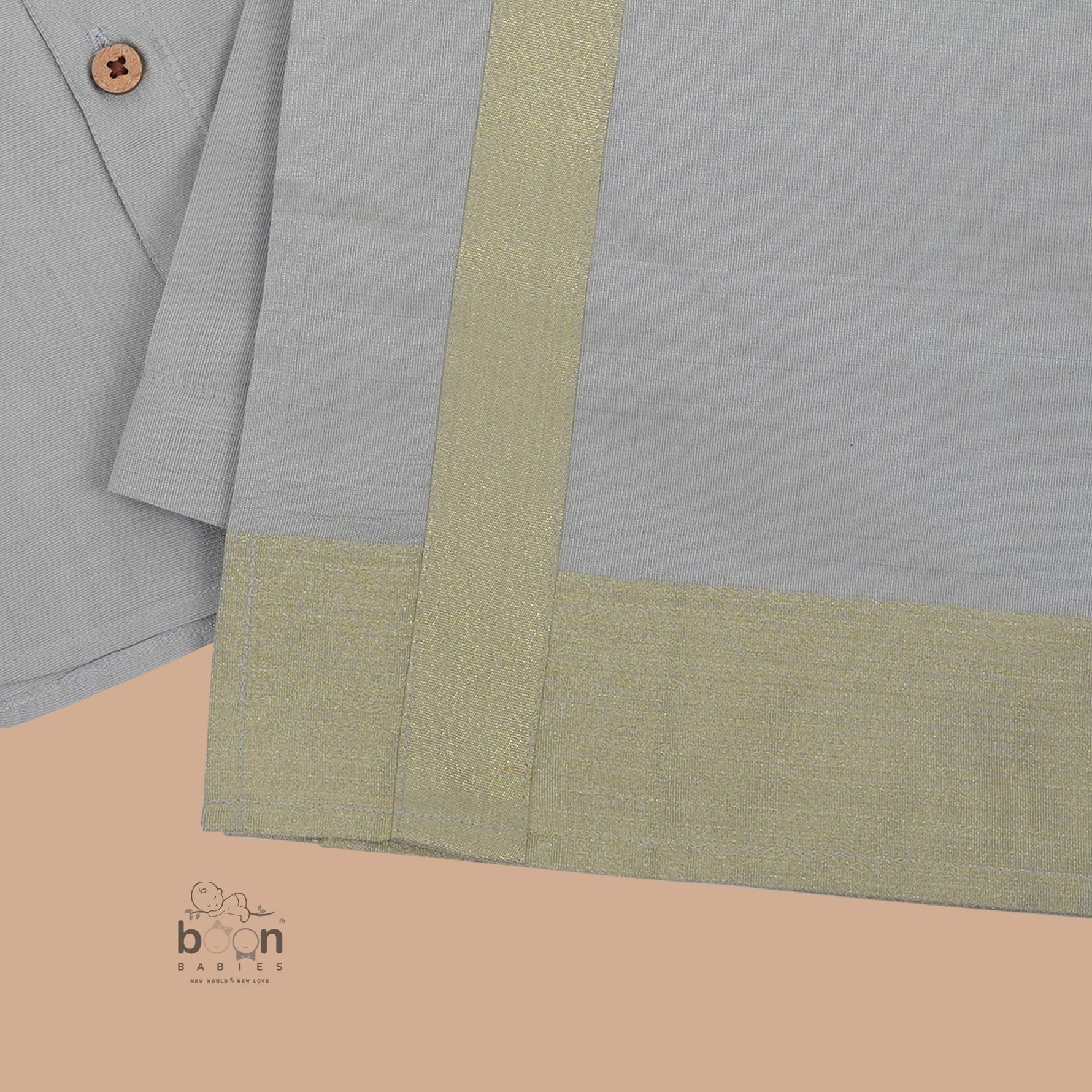 Grey silk dhoti set with golden zari border for boys (6M–5Y). Stylish, festive & comfortable for Onam and special occasions.