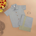 Grey silk dhoti set with golden zari border for boys (6M–5Y). Stylish, festive & comfortable for Onam and special occasions.