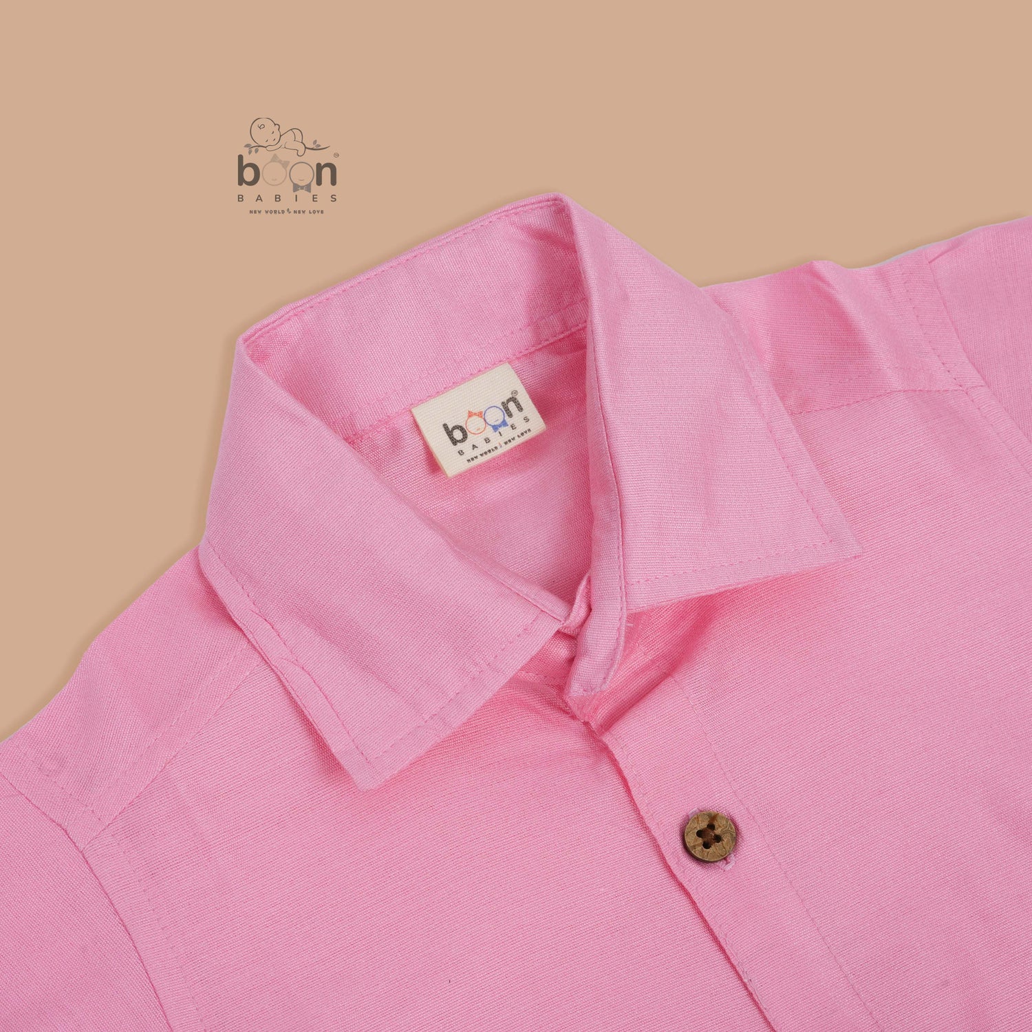 Pink silk dhoti set with golden zari border for boys (6M–5Y). Festive, traditional & baby-comfort friendly.