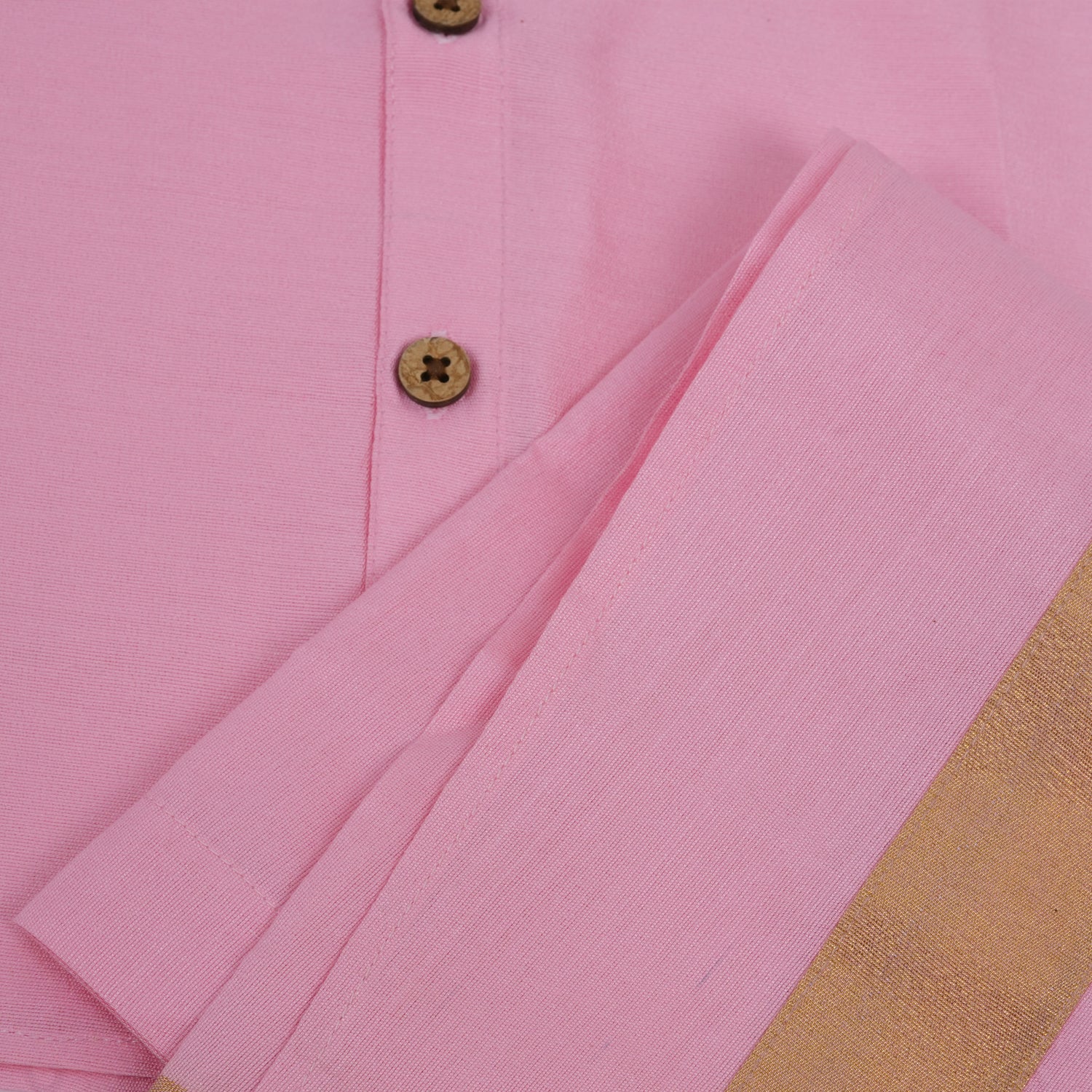 Pink silk dhoti set with golden zari border for boys (6M–5Y). Festive, traditional & baby-comfort friendly.