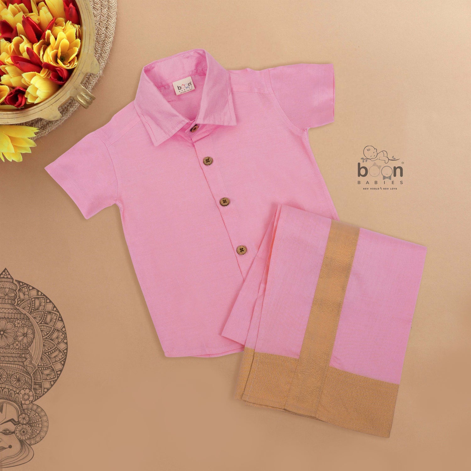 Pink silk dhoti set with golden zari border for boys (6M–5Y). Festive, traditional & baby-comfort friendly.