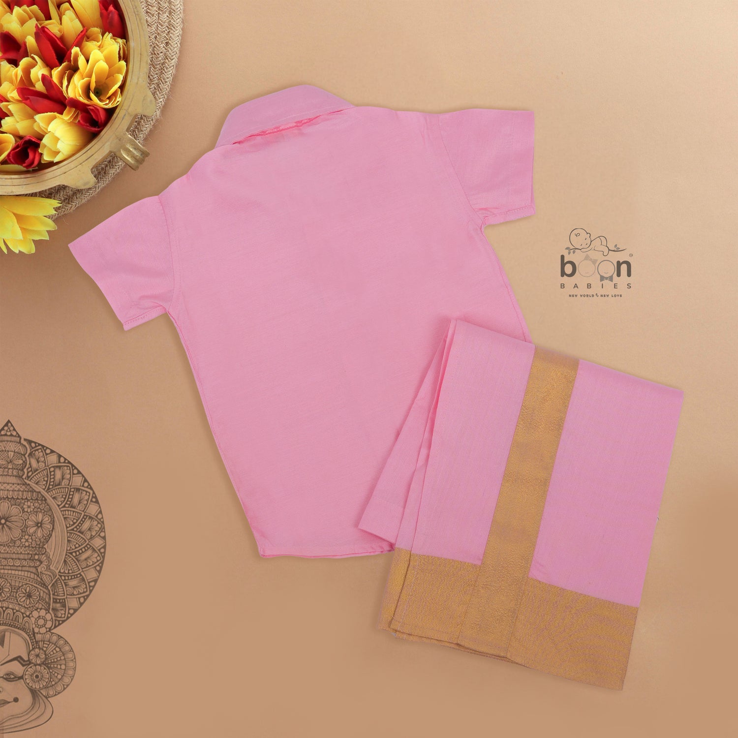 Pink silk dhoti set with golden zari border for boys (6M–5Y). Festive, traditional & baby-comfort friendly.