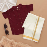 Maroon silk shirt with Mandarin collar paired with white silk dhoti. Ages 6M–5Y. Perfect ethnic festive & wedding wear for boys.
