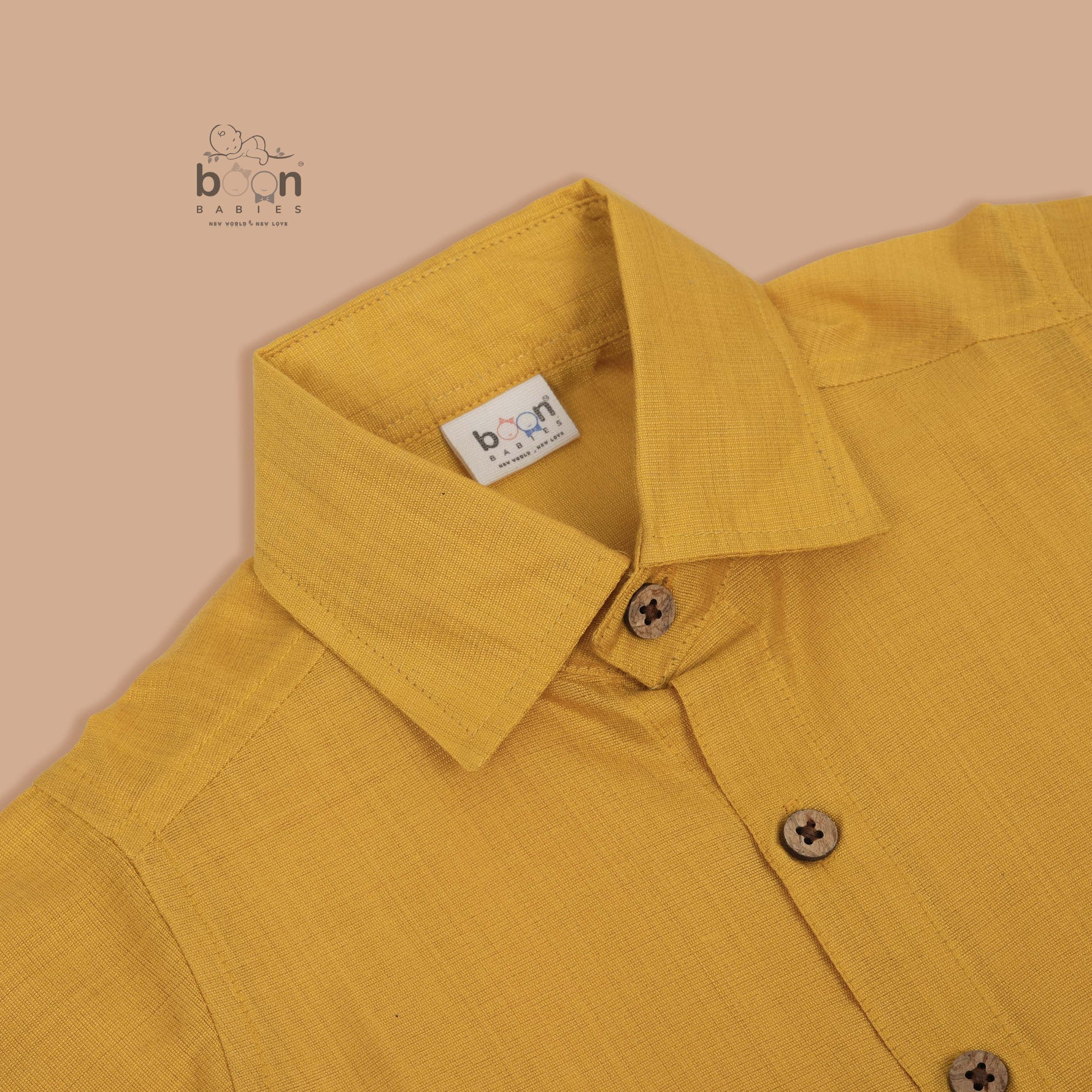 Traditional silk dhoti set in mustard yellow with golden zari border for boys (6M–5Y). Perfect festive wear for Onam & temple visits.