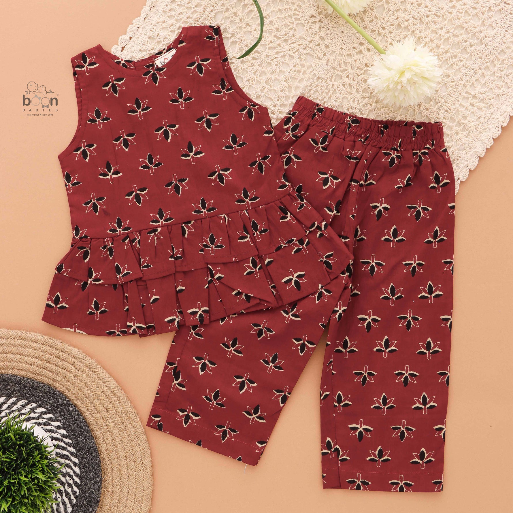 Stylish maroon floral top & pant set in slub cotton with lining. Ages 6M–4Y. A chic and comfortable festive & casual outfit.
