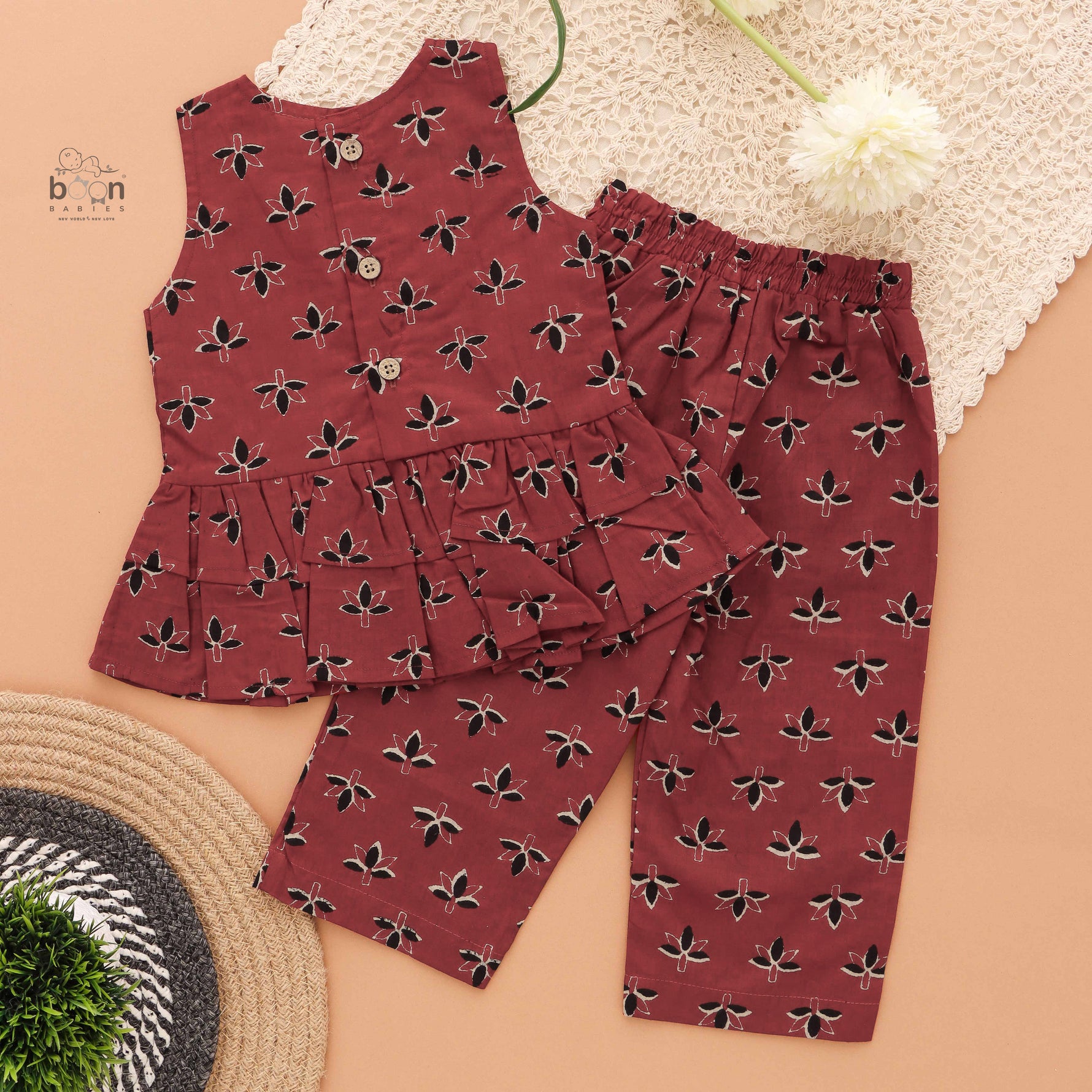 Stylish maroon floral top & pant set in slub cotton with lining. Ages 6M–4Y. A chic and comfortable festive & casual outfit.