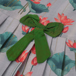 Cute cotton sleeveless frock with lotus print & bow. Perfect for ages 1–4 years. Stylish, breathable & comfy for everyday and festive wear.