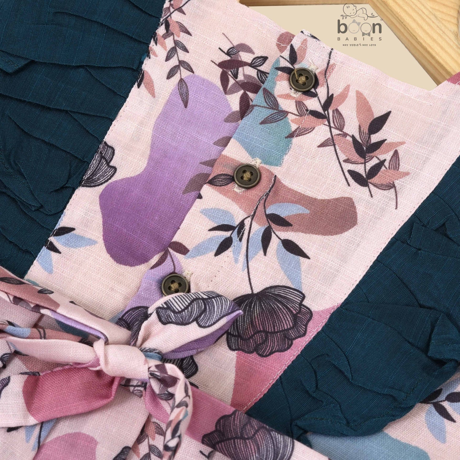 Girls pastel digital printed slub cotton frock with front ruffle frills (1–4Y). Stylish, breathable & perfect for festive and casual wear.