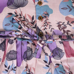 Sleeveless frock for girls aged 1 to 4 years in slub cotton, featuring abstract floral pastel print in lavender, pink, blue, and beige – from Boon Babies, Coimbatore.