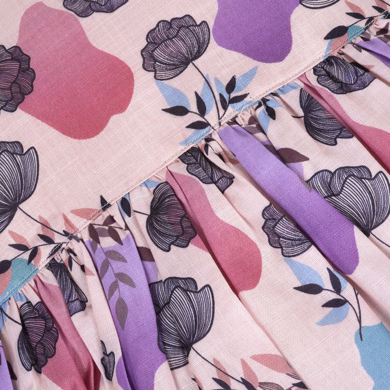 Sleeveless frock for girls aged 1 to 4 years in slub cotton, featuring abstract floral pastel print in lavender, pink, blue, and beige – from Boon Babies, Coimbatore.