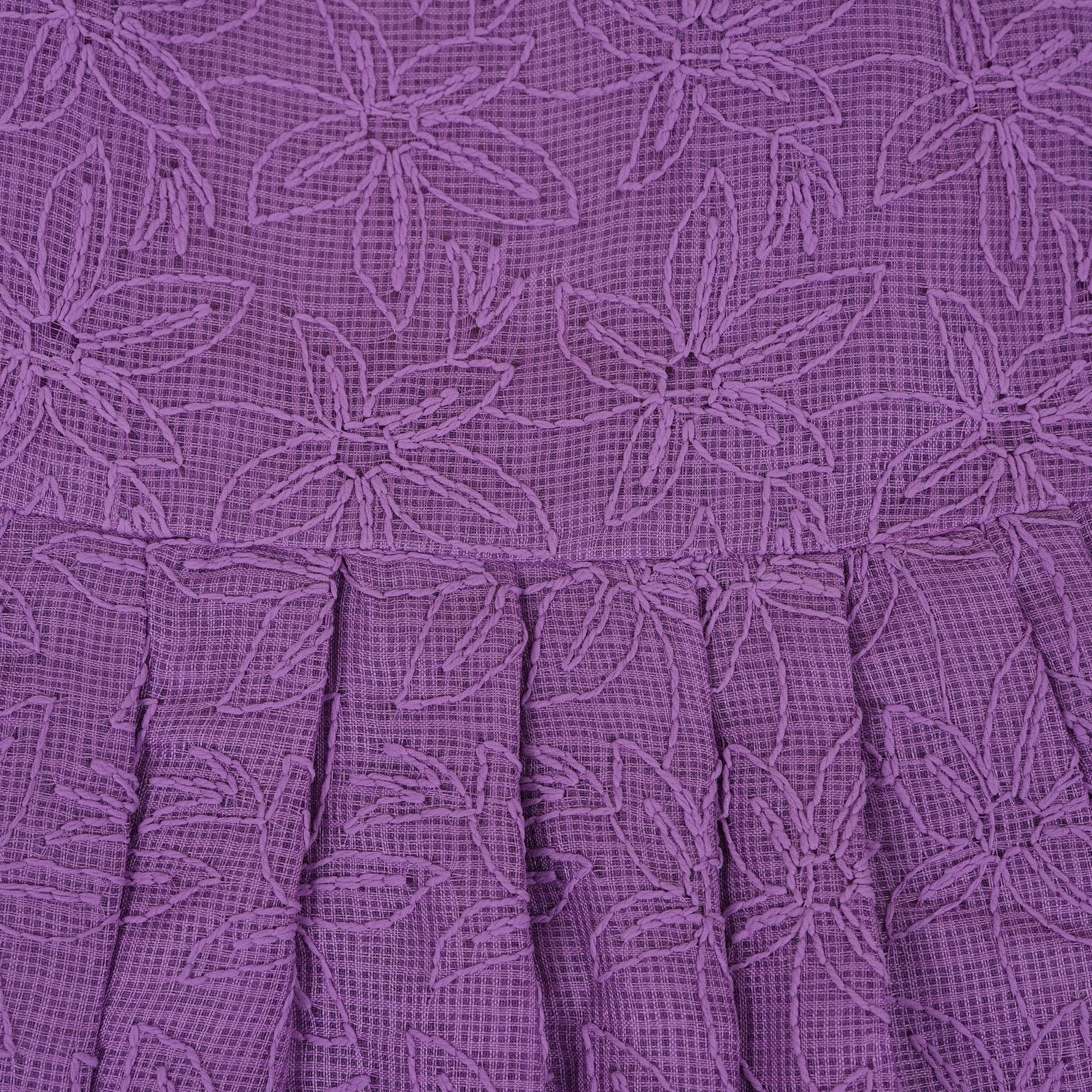 Orchid purple Hakoba frock for baby girls, sleeveless with floral embroidery and pleated skirt, displayed flat on beige background with soft props.